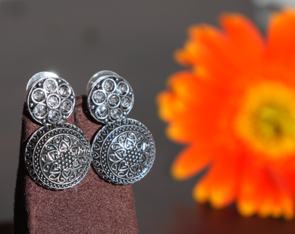 German Silver Toned Flower Earrings with Transparent Stone .