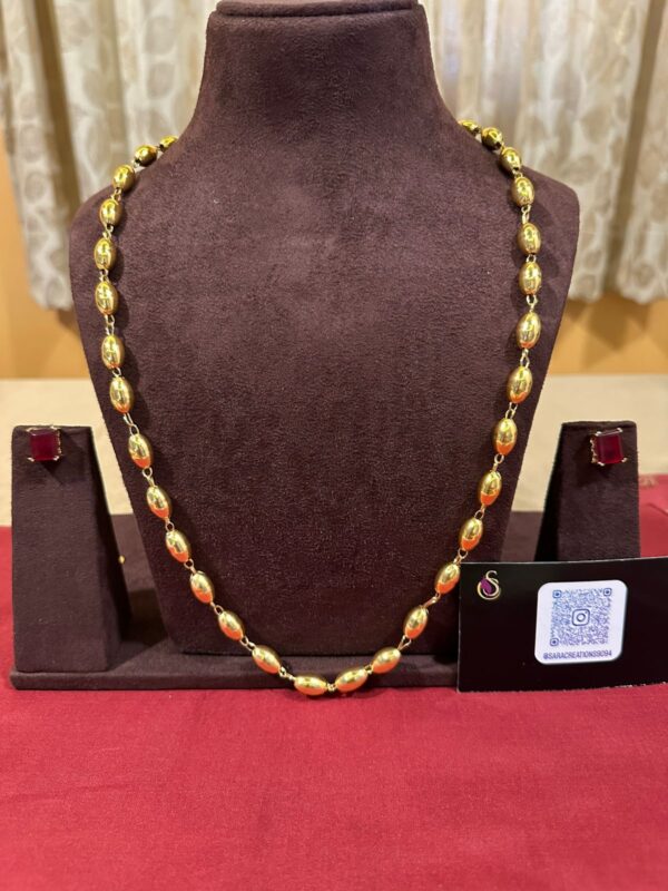 Elegant Brass Gold-Toned Necklace with Vibrant Red Stone Earrings